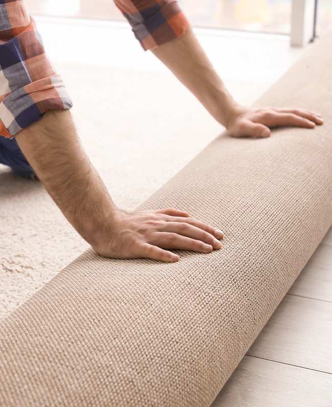 laying down carpet